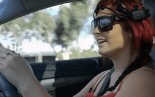 woman driving car emotiv EPOC plus headset brain controlled technology