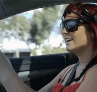 woman driving car emotiv EPOC plus headset brain controlled technology
